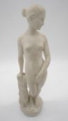 A Parianware figure of 'The Greek Slave' after the marble sculpture by Hiram Powers. Signed and