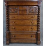 A 19th century mahogany Scottish chest of drawers with and arrangement of drawers flanked by