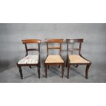 A near pair of mid 19th century mahogany bar back dining chairs along with a Regency style dining