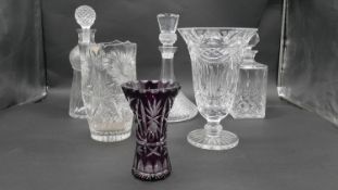 Collection of crystal and glass. Including two boxed cut crystal vases, a Bohemian amethyst cut to