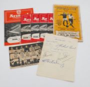 A collection of six vintage Arsenal programmes along with a signed team photograph.