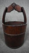 A Chinese antique wooden rice bucket. H.66 W.37