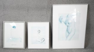 Three framed and glazed prints of drawings of nude female studies. One by Chinese artist Qu Lei Lei.