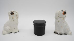 A fair of Staffordshire ceramic dogs and an ebony Victorian screw lidded pot. H.13.7 W.10