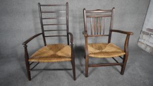 A 19th century beech ladder back armchair with woven rush seat along with a similar armchair. H.88