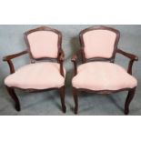 A pair of Continental style open armchairs in damask upholstery on cabriole supports. H.84