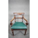 A mid 19th century mahogany bar back armchair with drop in seat on facetted tapering supports. H.89