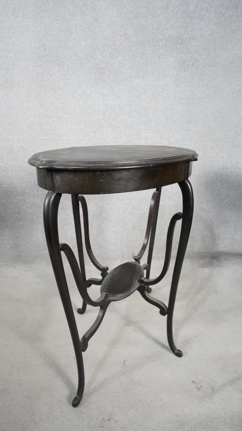 A late 19th century mahogany shaped oval top occasional table on slender cabriole supports united by - Image 2 of 3