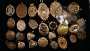 A large collection of lockets, pendants and locket coverings. Including twenty three rolled gold and