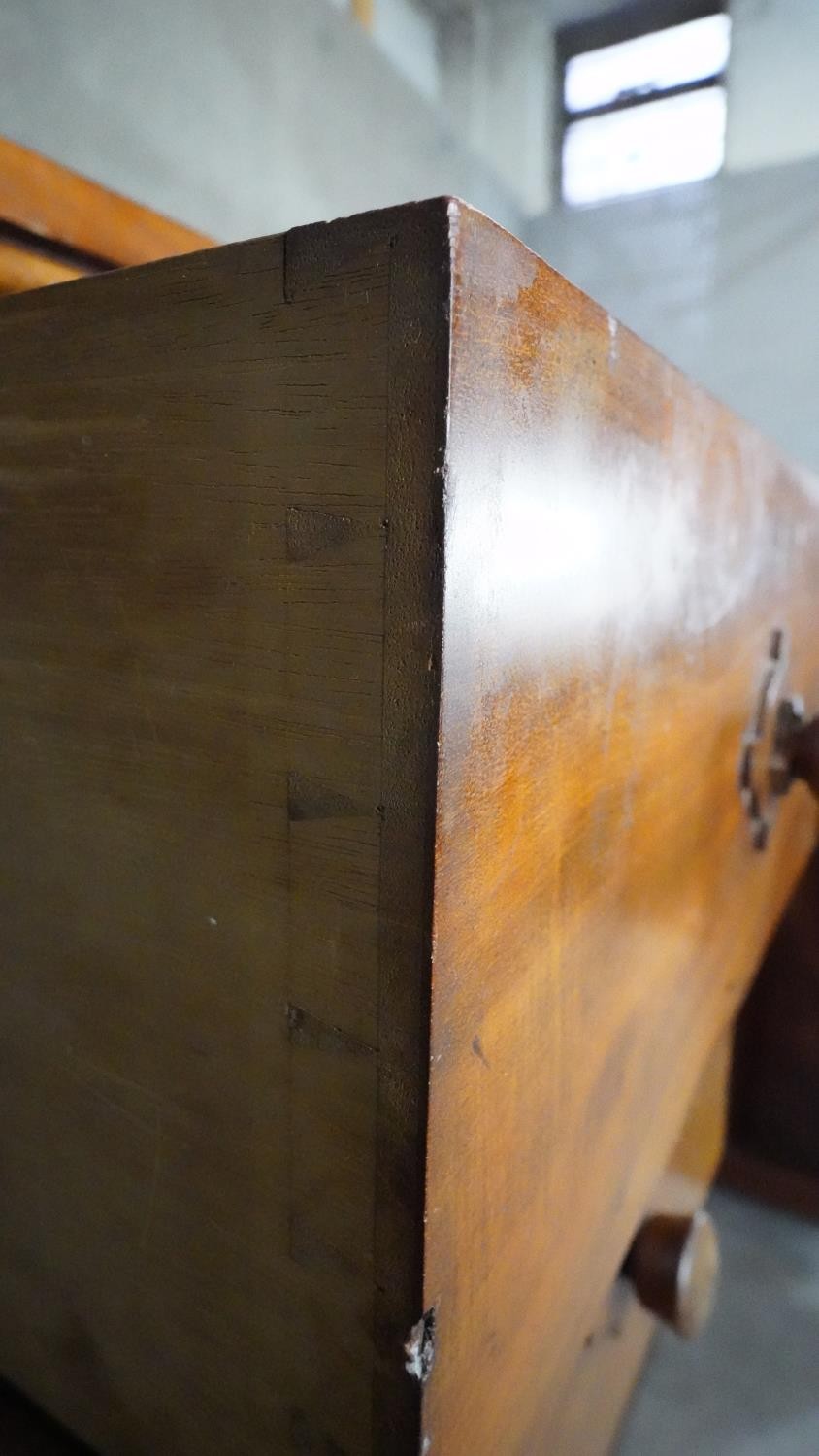 An mid 19th century mahogany linen cupboard with central panel doors flanked by two banks of four - Image 7 of 14