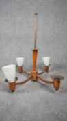 A mid century copper four branch chandelier with opaque white glass conical shades (3). H.60 W.43
