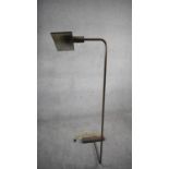 A Mid Century Cedric Hartman style 1UWV bronze effect floor lamp. The bronze triangular shade has