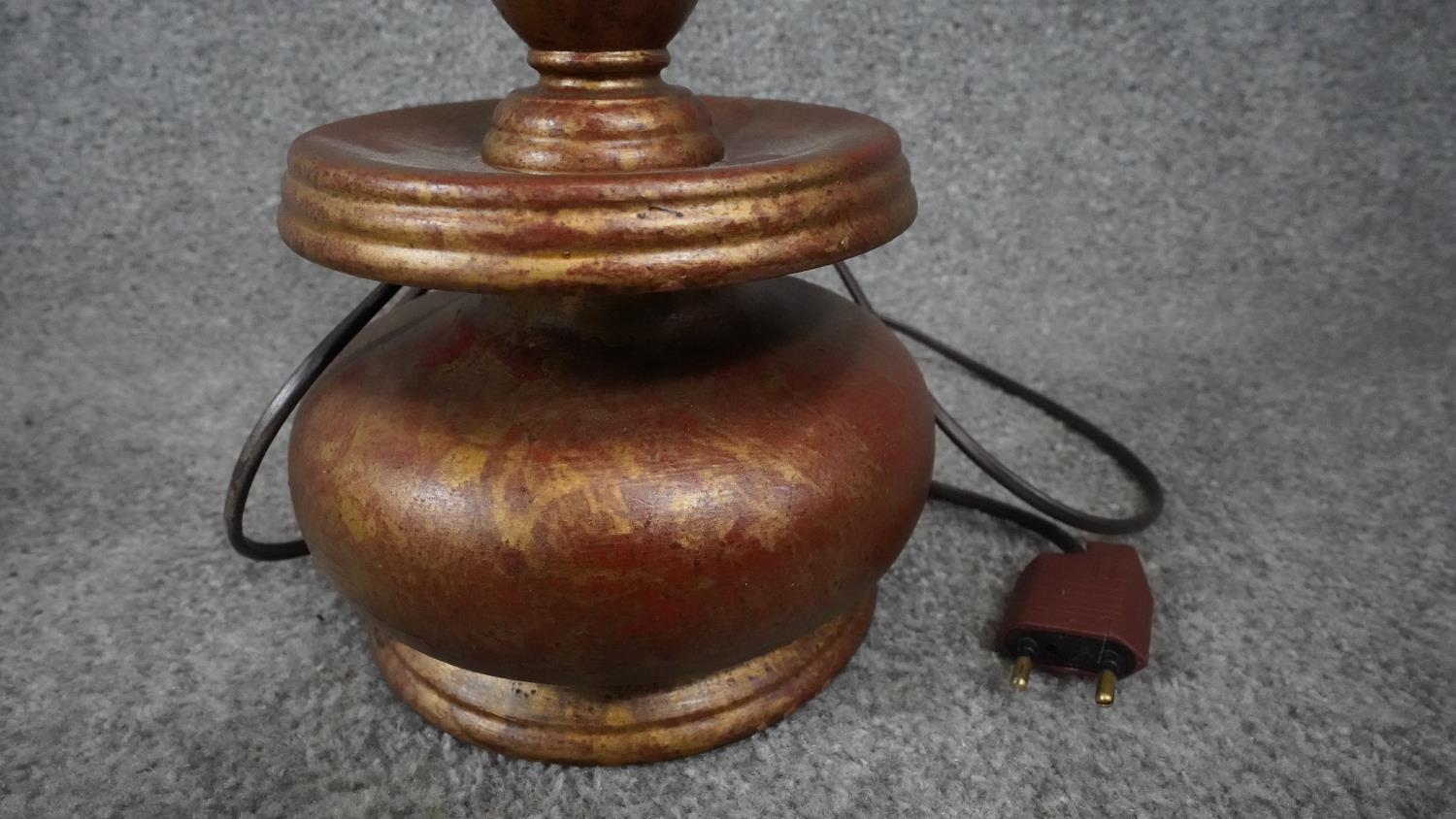 Three carved wooden and gilded table lamps. Including one with a stylised floral design. H.38 - Image 15 of 16