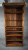 A full height oak open bookcase section with adjustable shelves. H.228 W.101 D.32