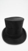 A vintage gent's moleskin top-hat retailed by City Cork Hat Company, boxed. H.17 W.23 D.31