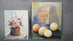 An oil on board of a copper pan filled with flowers, indistinctly signed, dated 1983 and an oil