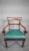 A mid 19th century mahogany bar back armchair with drop in seat on facetted tapering supports. H.89
