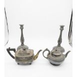 A pair of 19th century stylised floral design Sheffield plate candle sticks along with two silver