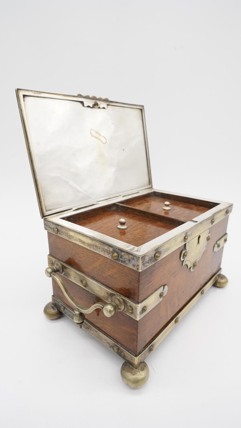 A Victorian silver plated and oak tea caddy, in the form of a strapped chest with silver plated - Image 2 of 6