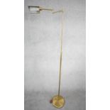 A 1970's Holtkoetter pharmacy brass floor lamp designed and made in Germany by Holtkoetter