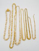 Five Victorian ivory bead necklaces and a bone bead necklace. All with carved and polished ivory