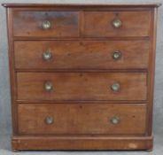 A Victorian mahogany chest of drawers with moulded rounded corners resting on plinth base. H.118 W.