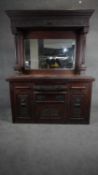 A late 19th century carved walnut mirror backed sideboard. H.197 W.152 D.53