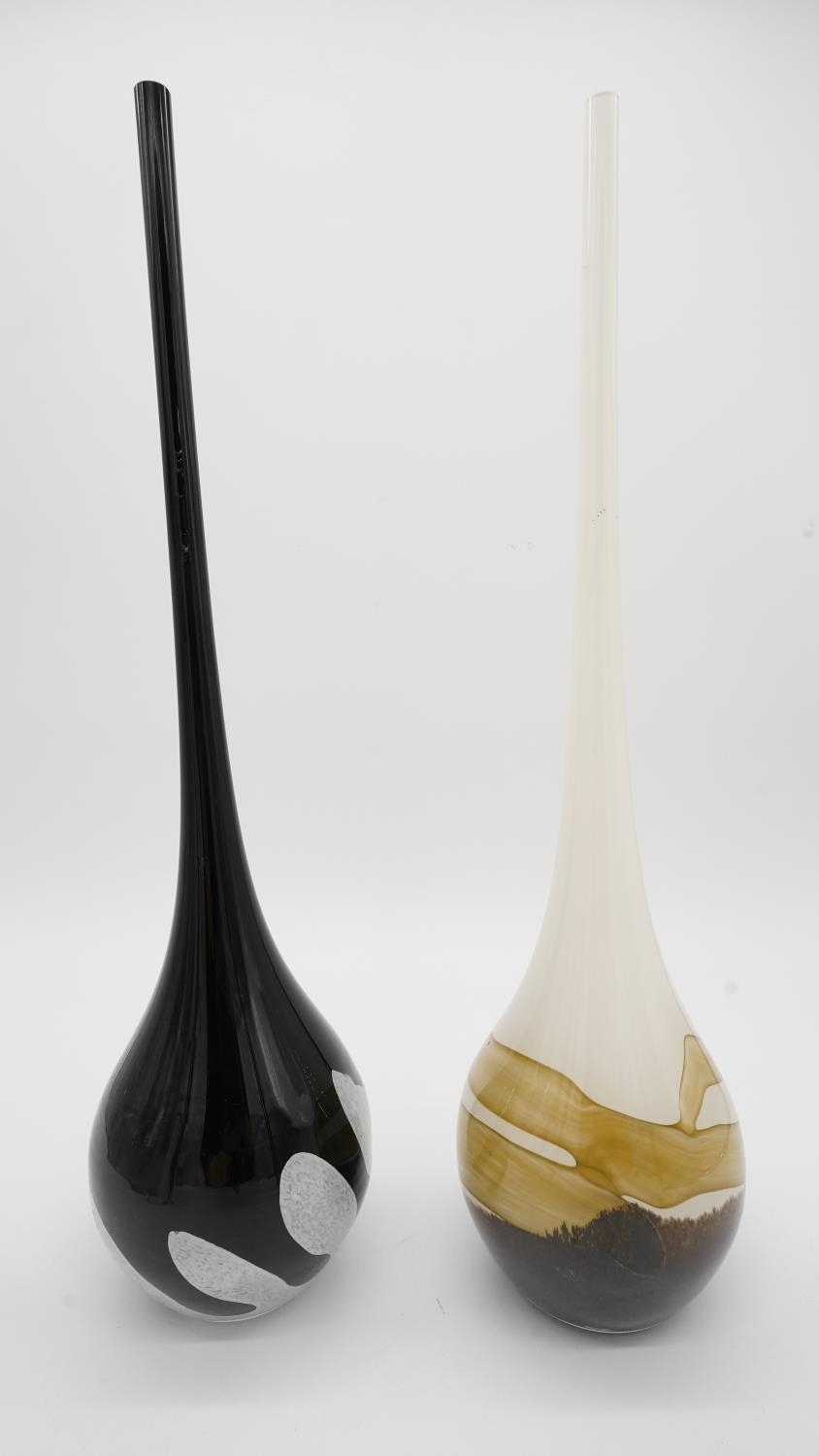 Two tear drop Art Glass vases with elongated necks. One black with white marbling and the other