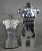 Two shop mannequins. One of a male torso, fibreglass with a chrome finish and the other of a