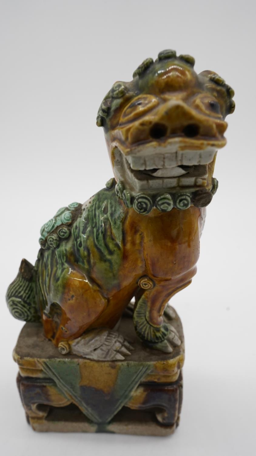 A pair of Sancai Kangxi style late Qing ceramic Foo dogs with green and yellow glaze. Unmarked. H.19 - Image 2 of 7