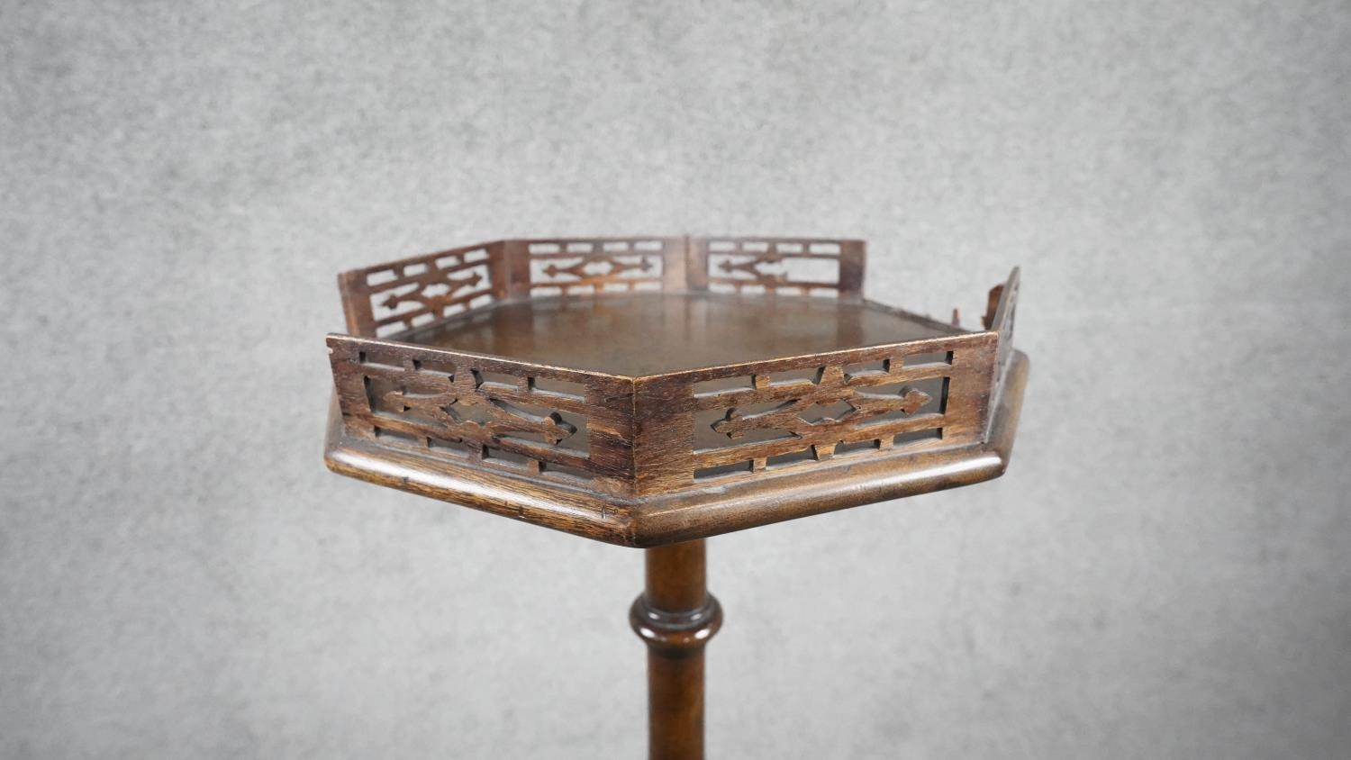 A late 19th century mahogany urn stand with pierced galleried top on carved pedestal with tripod - Image 2 of 7