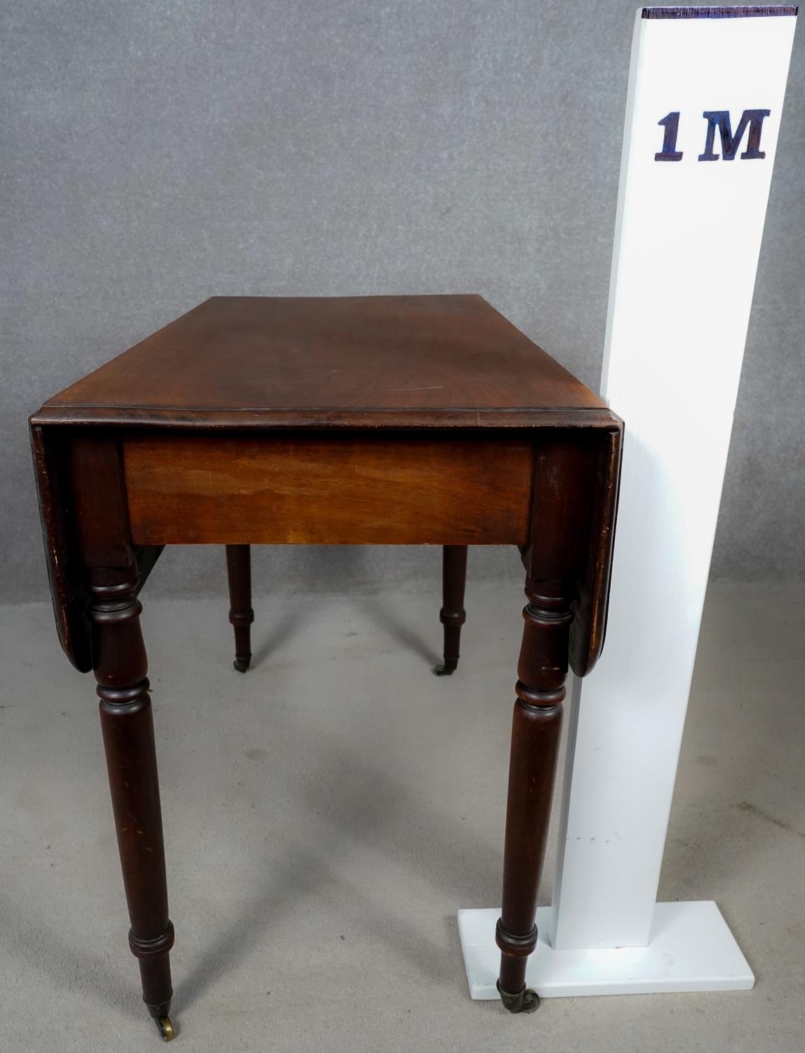 A 19th century mahogany drop flap Pembroke table with frieze drawer on turned tapering supports - Image 7 of 7