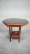 A late 19th century mahogany hexagonal topped occasional table on turned tapering supports united by