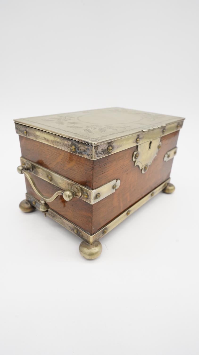 A Victorian silver plated and oak tea caddy, in the form of a strapped chest with silver plated - Image 4 of 6