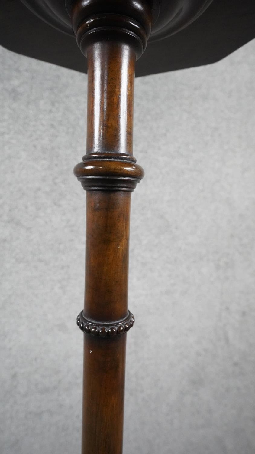 A late 19th century mahogany urn stand with pierced galleried top on carved pedestal with tripod - Image 3 of 7