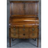 A 19th century Continental mahogany and ebony and satinwood inlaid cylinder bureau cabinet with