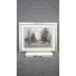 Victor Kelly RBSA, PPBWS - A framed and glazed watercolour on paper of a winter lake with trees.