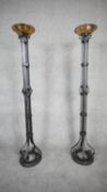 A pair of large Arts and Crafts wrought iron and brass floor standing candle holder/planters. H.