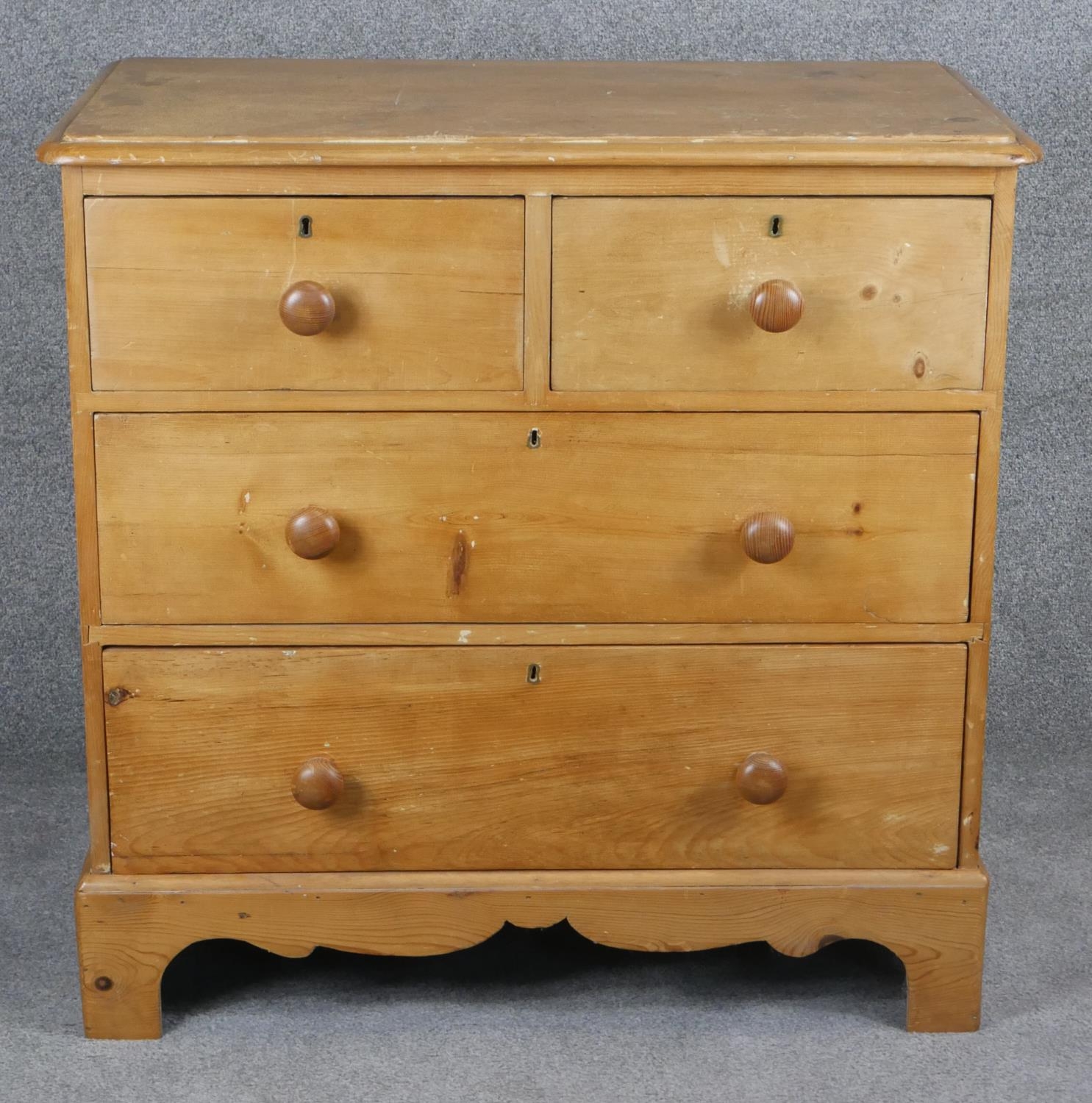 A 19th century pine chest of drawers on shaped bracket feet. H.84 W.86 D.50cm