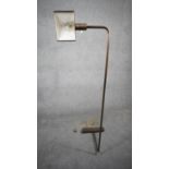 A Mid Century Cedric Hartman style 1UWV bronze effect floor lamp. The bronze triangular shade has