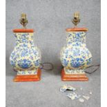 A pair of vintage hand painted ceramic Chinese vase design table lamps, stylised blue floral