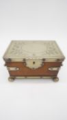 A Victorian silver plated and oak tea caddy, in the form of a strapped chest with silver plated