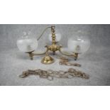 A vintage three branch scrolling design brass chandelier with frosted glass etched floral design