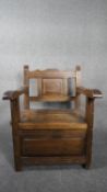 An Eastern teak box chair with lift up compartment to the base. H.86 W.63 D.49