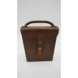 An antique tan leather cased James Dixon & Sons hunting saddle canteen set. Comprising of locking