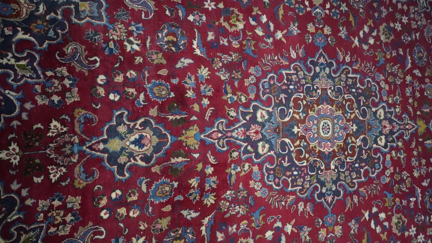 A Persian Mershed carpet with central medallion within a blue foliate border. H.330 W.242 - Image 2 of 5