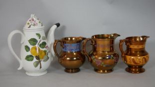 Three antique copper lustre ware pitchers along with a Port Merion Pomona design coffee pot with