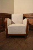 A vintage Art Deco style armchair upholstered in calico and leather on tapering block feet. H.76 W.