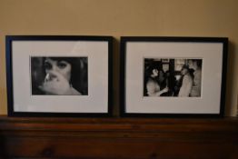 A pair of framed and glazed black and white drinking themed photographic reproductions. H.33 W.
