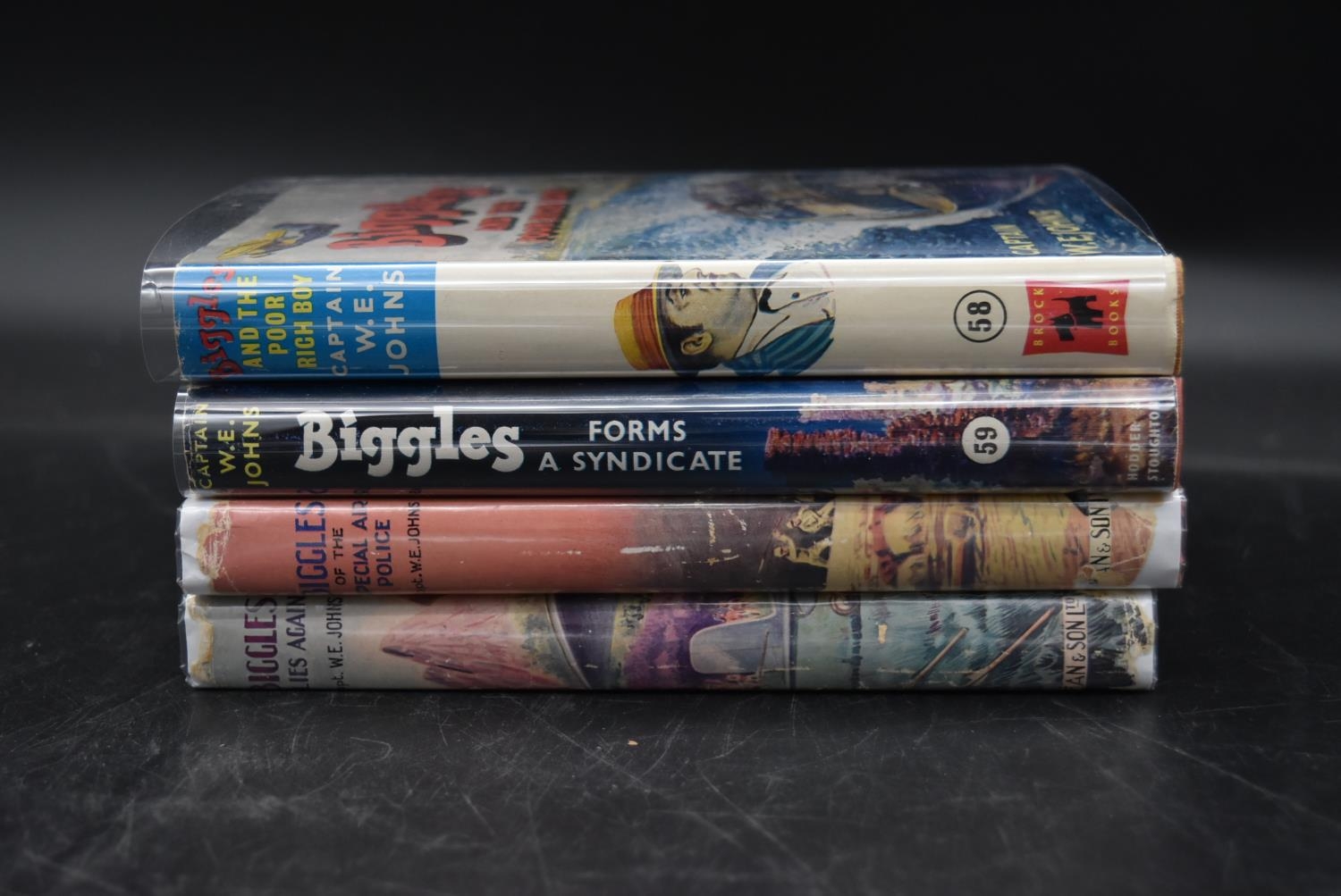 A collection of four first edition Biggles novels. H.20 W.13cm (4)